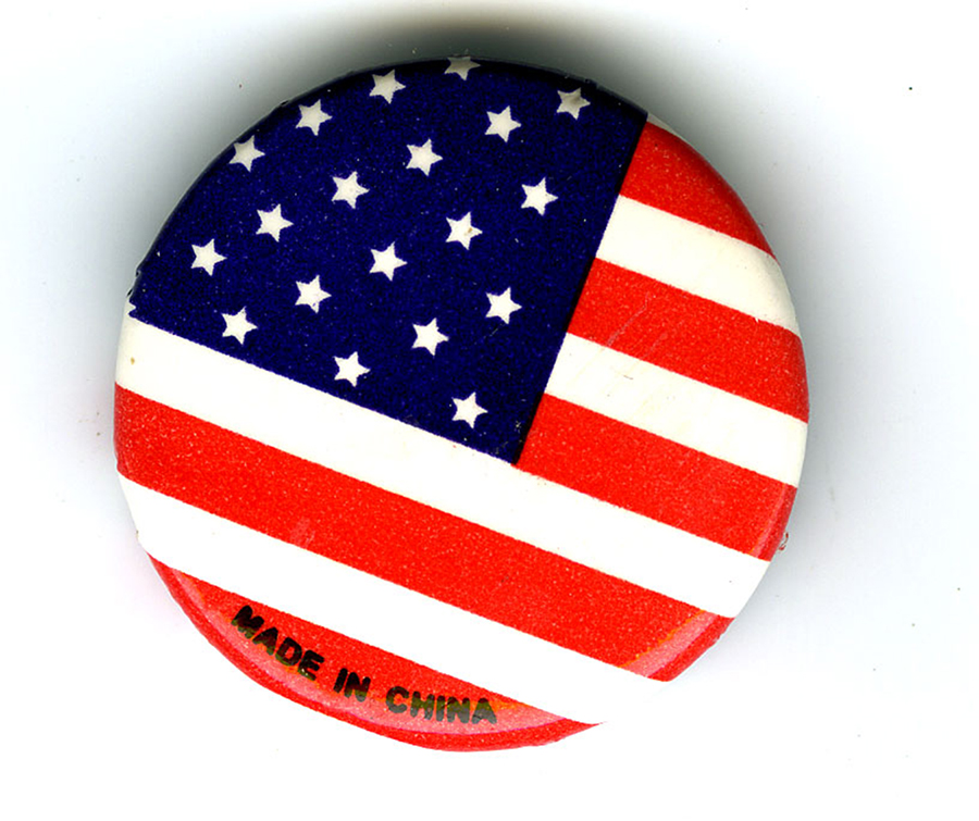 Circular USA flag pin, with 'Made in China' written on the bottom